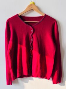 Red Cardigan With a Beaded Trim and Button-Up Front